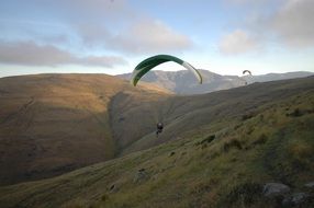 paragliding in mountains in Switzerland