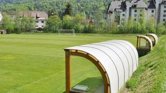 benches for spectators over the football field