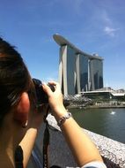 woman Photographing Marina Bay Sands hotel, Singapore