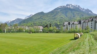 football field at the foot of the mountain