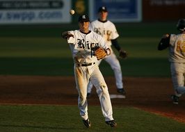 Baseball player with the ball on the field