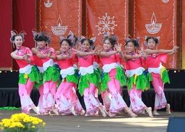 children in colorful costumes on stage at Diwali festival