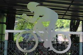 metal cyclist sign