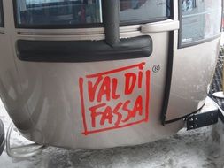 cabin of the ski lift above the snow on Val di Fassa