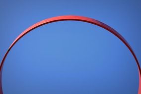 Basketball hoop on a background of blue sky
