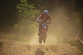 motocross in the dust in the sun