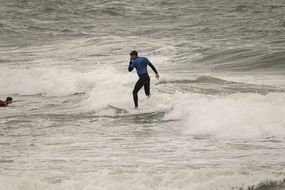 surfer on the waves of the north sea