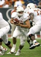 american football in white uniform