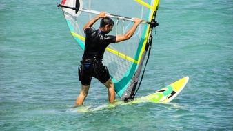 begginner windsurfer on ocean