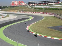 extreme Motorcycles racing on winding trace