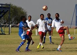 black people play football