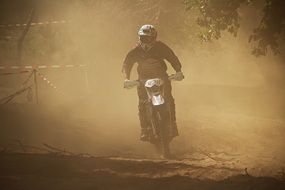 motocross in a dusty haze