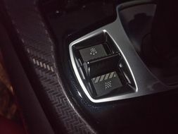 buttons in the interior of a luxury jaguar