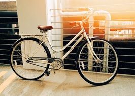 parked white classic bicycle