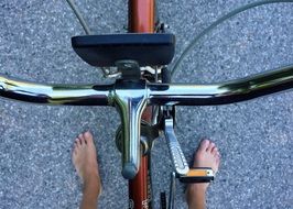 barefoot cyclist