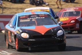 colorful racing cars on track