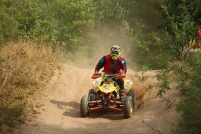 Quad cross on a sand