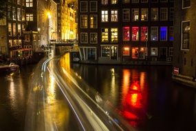 Cars on the road in Amsterdam at night