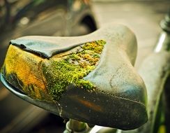 broken saddle of an old bicycle close up