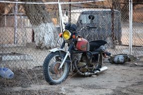 picture of the old broken motorcycle