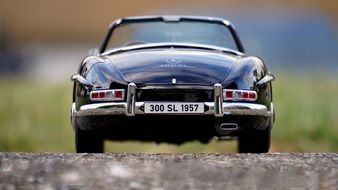 1950s black Mercedes in a miniature on the pavement