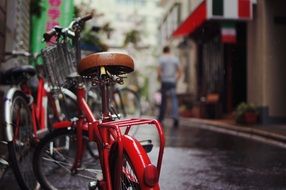 Bicycle under the rain on the street