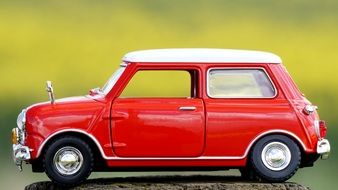 side view of a red car in miniature