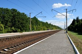 empty platform near the railroad tracks