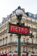 Metro sign on the street in Paris