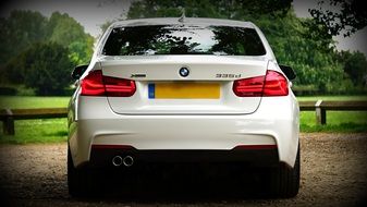 rear view of a white luxury BMW