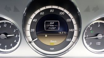 speedometer on dashboard of fast car