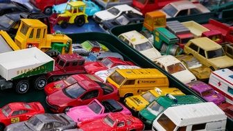 multi-colored toy cars on the table