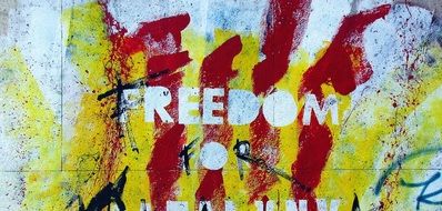 colorful graffiti with the word freedom