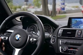 BMW car steering wheel and dashboard