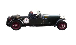 man in an old car on a white background