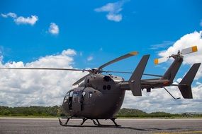 dark Helicopter on landing field