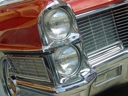 headlights of a vintage american car close-up