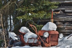 Old Tractor on a wintry farm