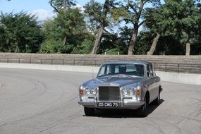 silver rolls royce in the bright sun