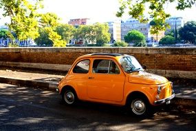 yellow fiat 500 as a retro