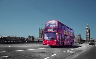 double-decker bus rides on the roads of London