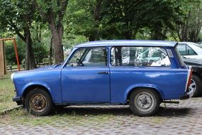 blue retro car in a parking lot in Germany