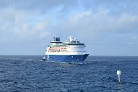 A ship with tourists in the ocean