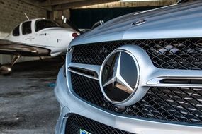 Closeup photo of Metal Mercedes-Benz Car