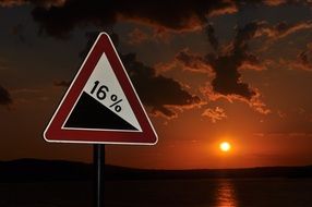 16% road sign in front of sea at Sunset in Bulgaria