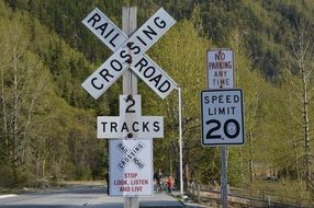traffic signal crossing railroad 2 tracks, speed limit 20