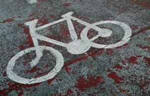 White bicycle sign on the road