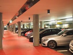 cars in a parking lot in a multi-storey car park