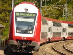 red train on rails in Luxembourg