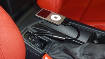 IPod on a leather car interior